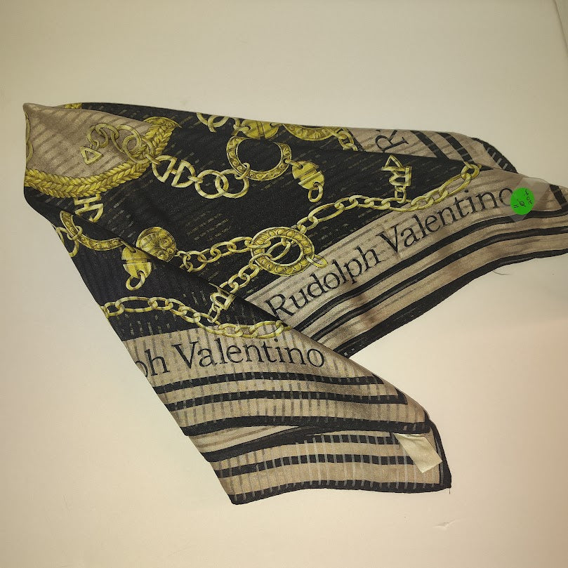 This is a Rudolph Valentino silk scarf with a black and gold chain pattern. #11