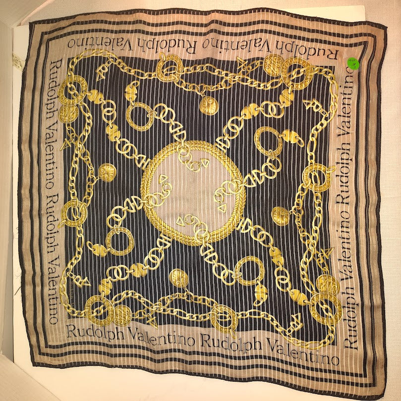 This is a Rudolph Valentino silk scarf with a black and gold chain pattern. #11
