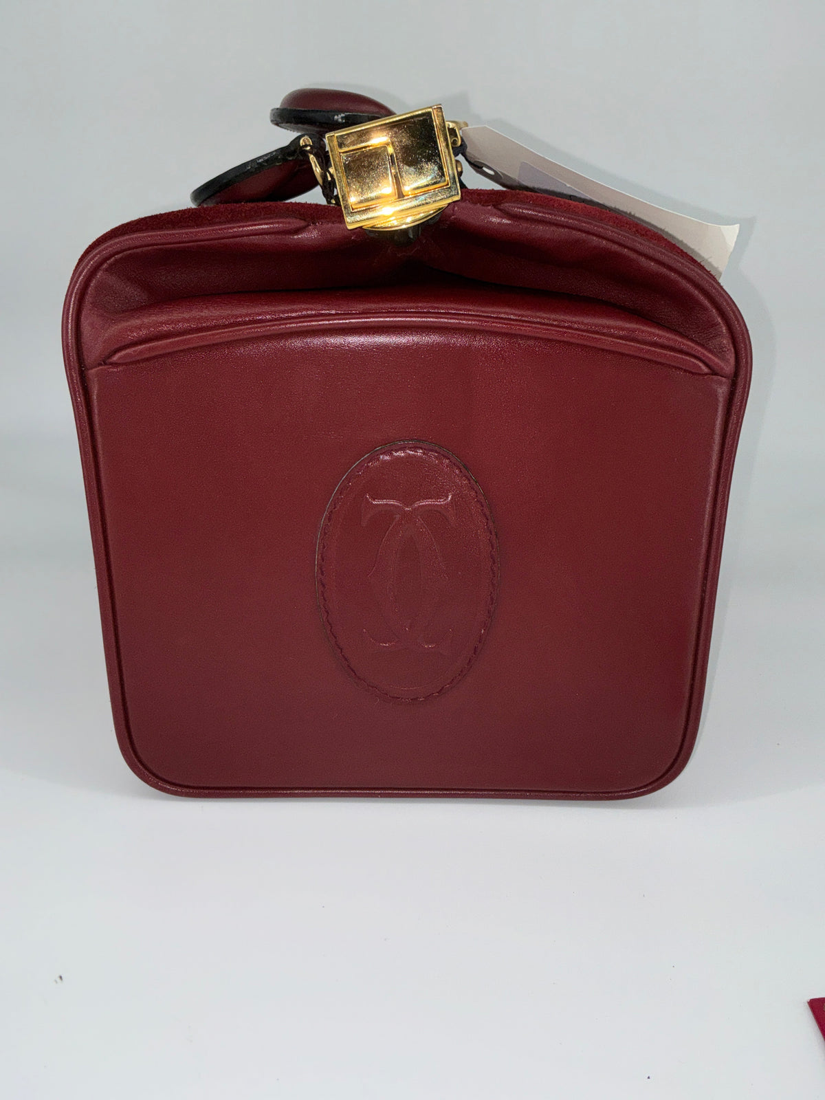 House of Melton vintage Les Must de Cartier bordeaux suede and leather doctor travel bag with gold-tone latch